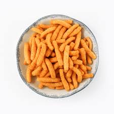 Top-down view of a bowl filled with Nongshim Saeukkang (Korean Shrimp Crackers) showing the crispy ribbed texture.